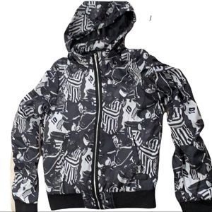 Adidas windbreaker Size XS in Black and white print. With hood. Full zip up.
